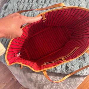 Stylish Tan Tote Bag with Red Interior